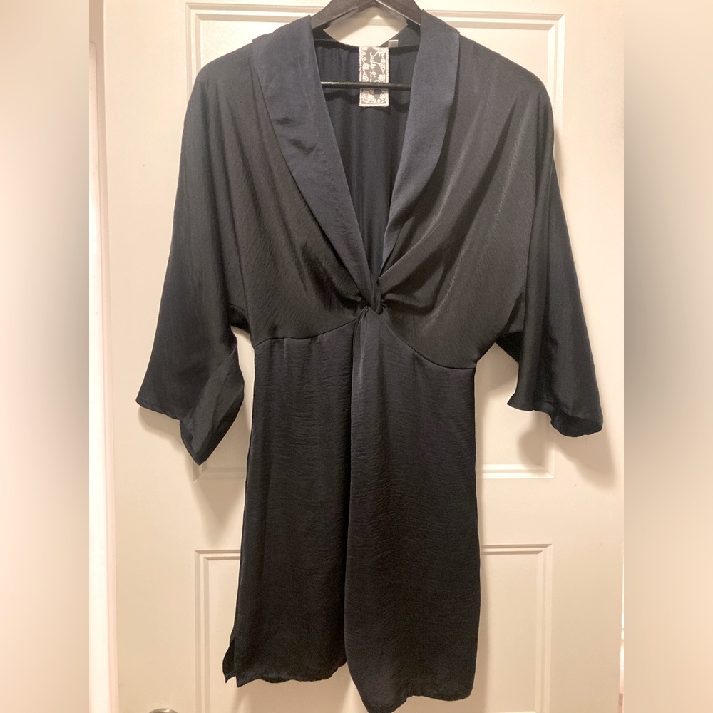 Very flattering mini dress. Dark navy blue. Worn only once, silky material.